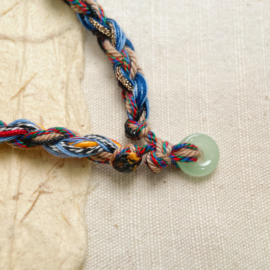 artisan adjustable bracelet with alloy accents
