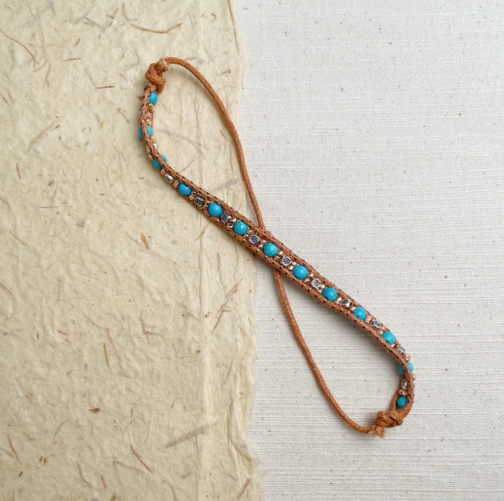 Handmade turquoise beaded wrap bracelet with brown cord, boho soul jewelry.