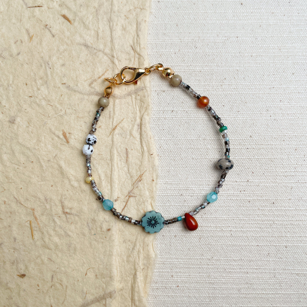Handmade dainty multicolor beaded bracelet with gold accents, boho soul jewelry.