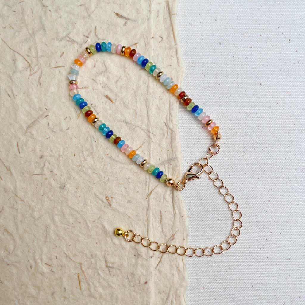 Handmade rainbow beaded bracelet with gold chain, boho soul jewelry.