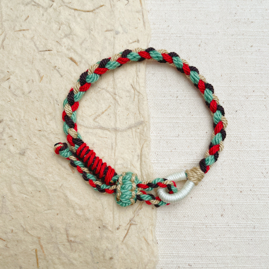 Handmade multicolor braided cord bracelet, friendship and protection jewelry.