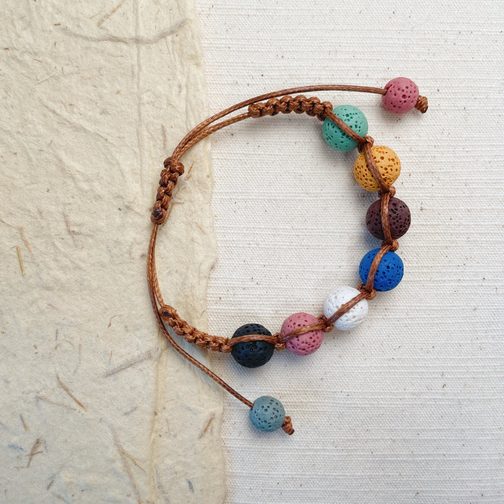 Handmade multicolor lava stone bracelet, natural volcanic bead diffuser jewelry.