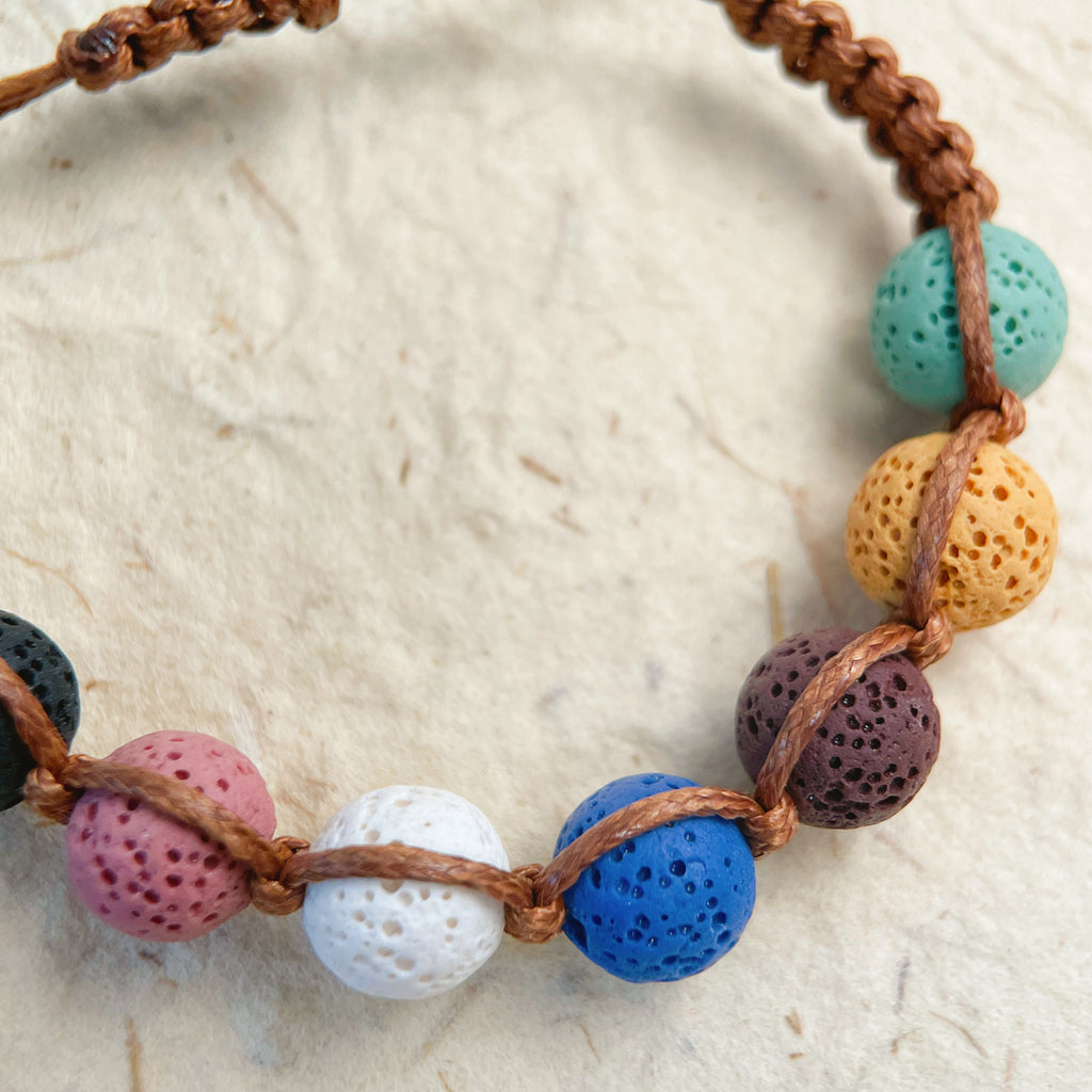 Bracelet with colorful beads on a textured surface