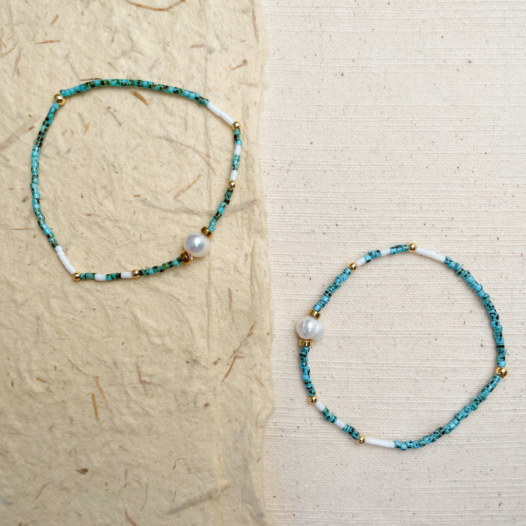 Handmade turquoise beaded bracelet set with pearl accents, boho minimalist jewelry.