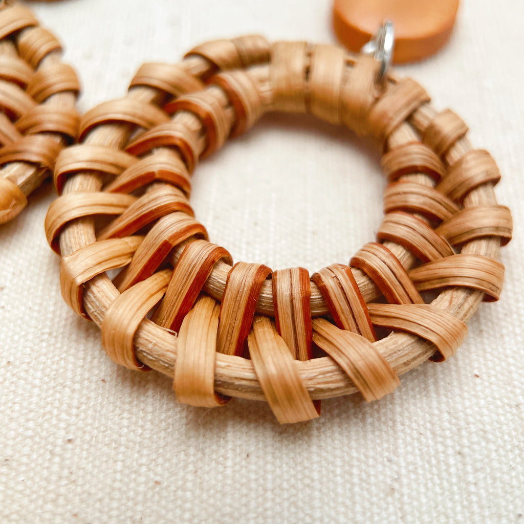 Eco-friendly woven earrings with wooden accents, earthy summer statement accessory
