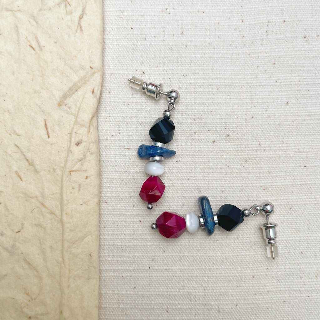 Short colorful handmade earrings with stacked irregular stones.
