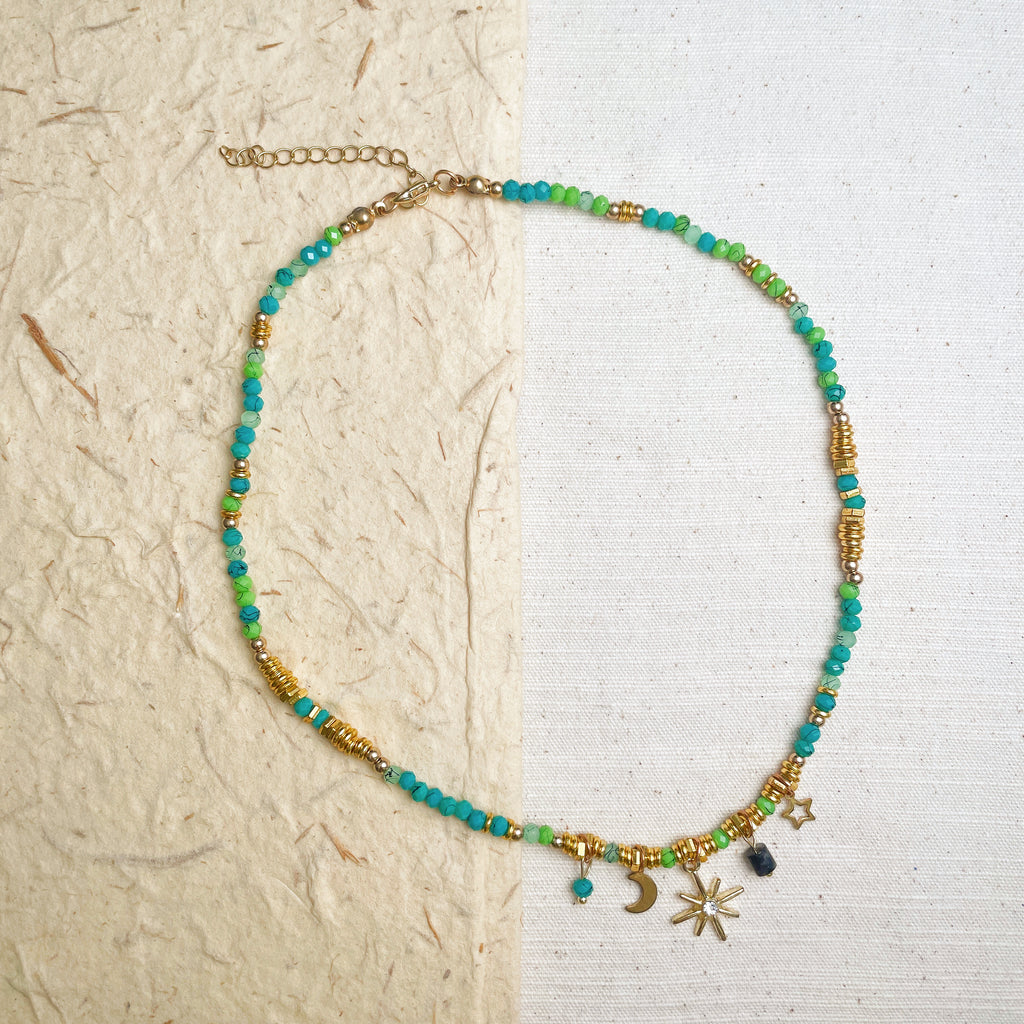 Mint green glass bead choker on woman, Y2K celestial charm necklace.